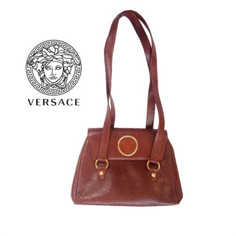 medaglioni argento versace|Gianni Versace Borse vintage .